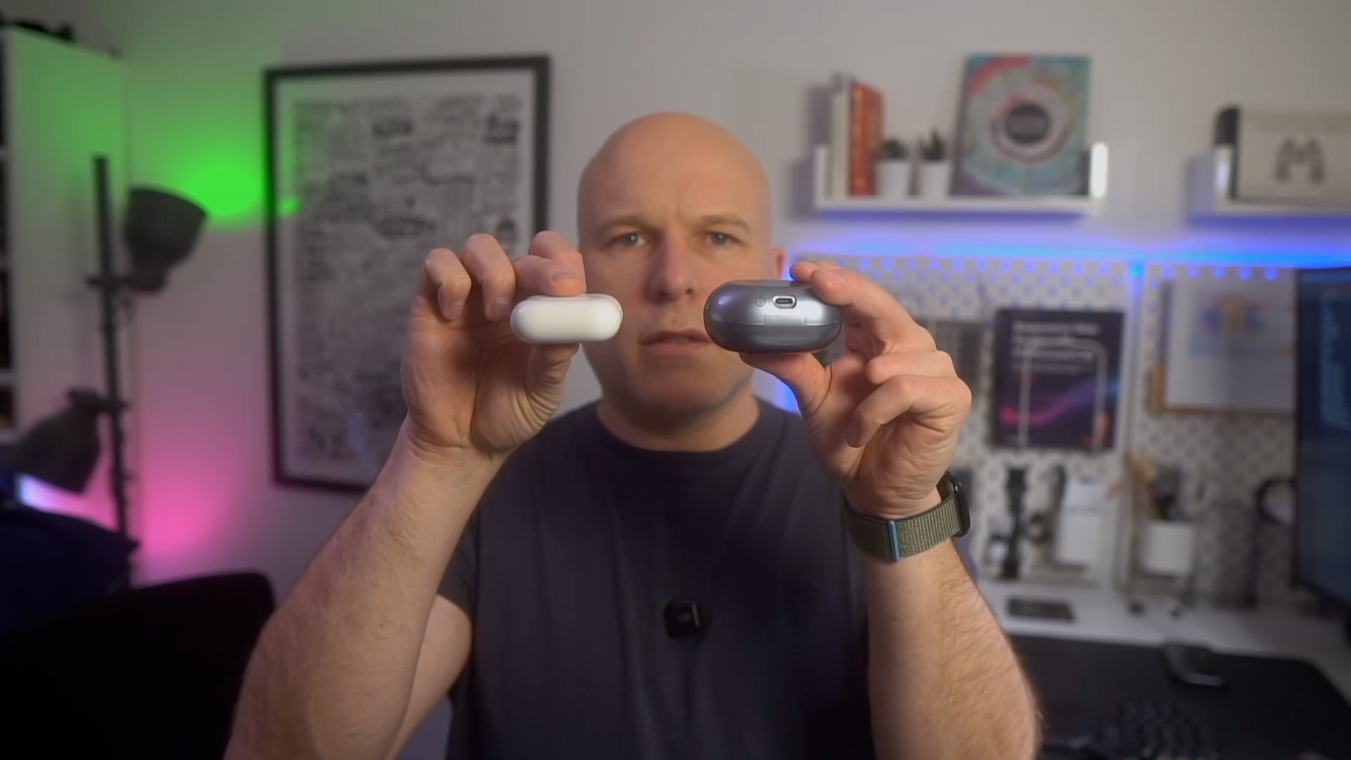 Holding up the SoundPEATS Clip1 case