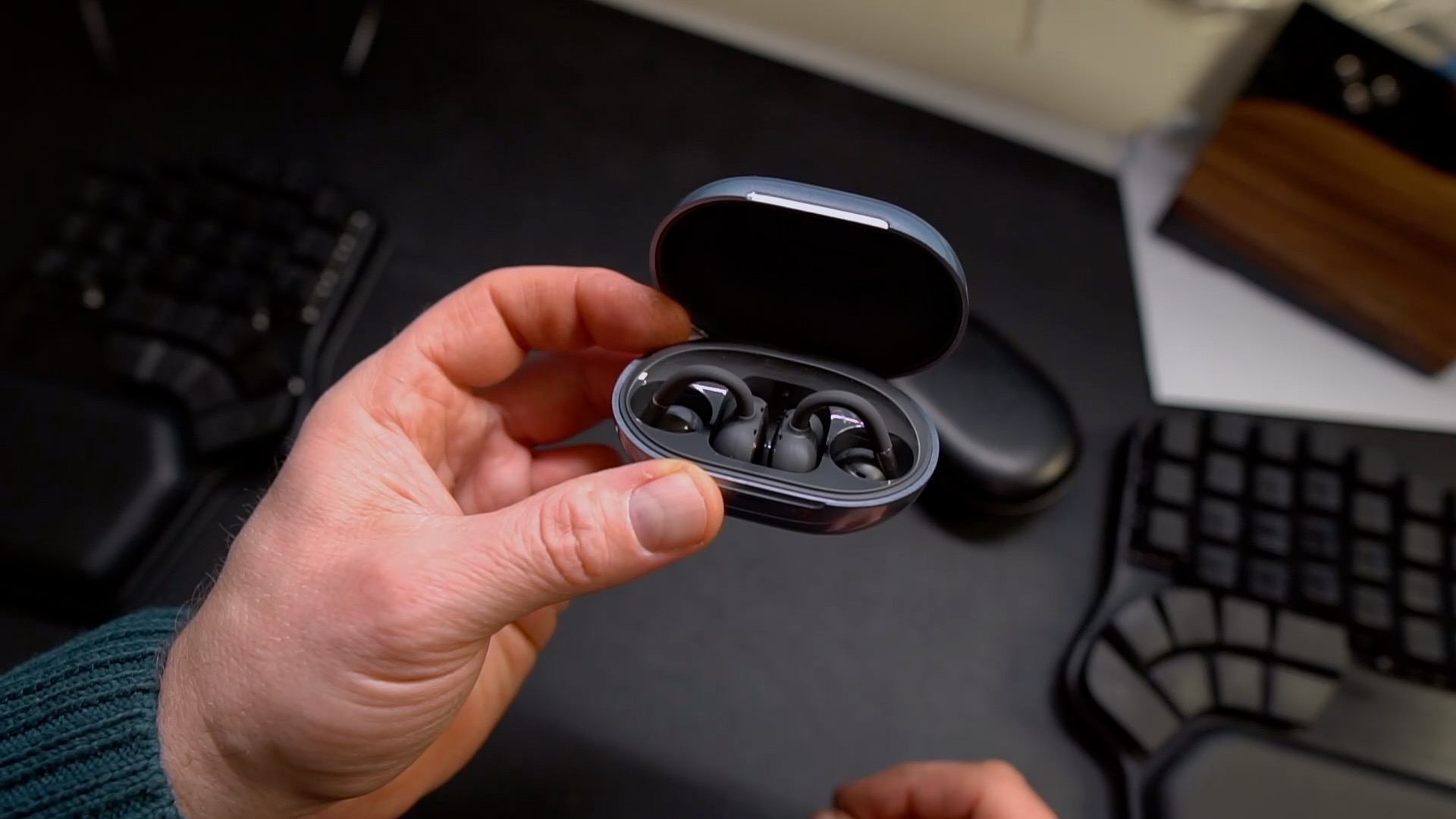 Inside the case of SoundPEATS Clip1 headphones