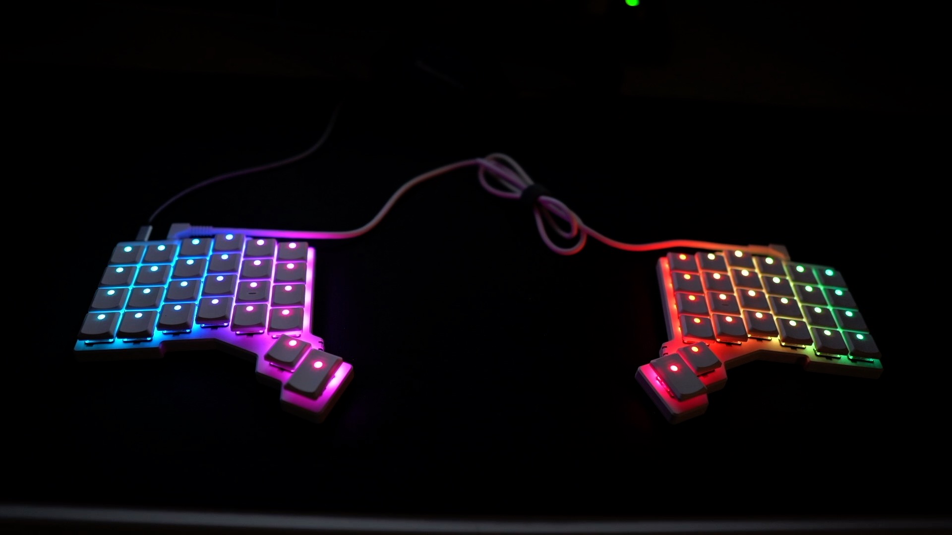 Voyager keyboard in dark with lighting showing